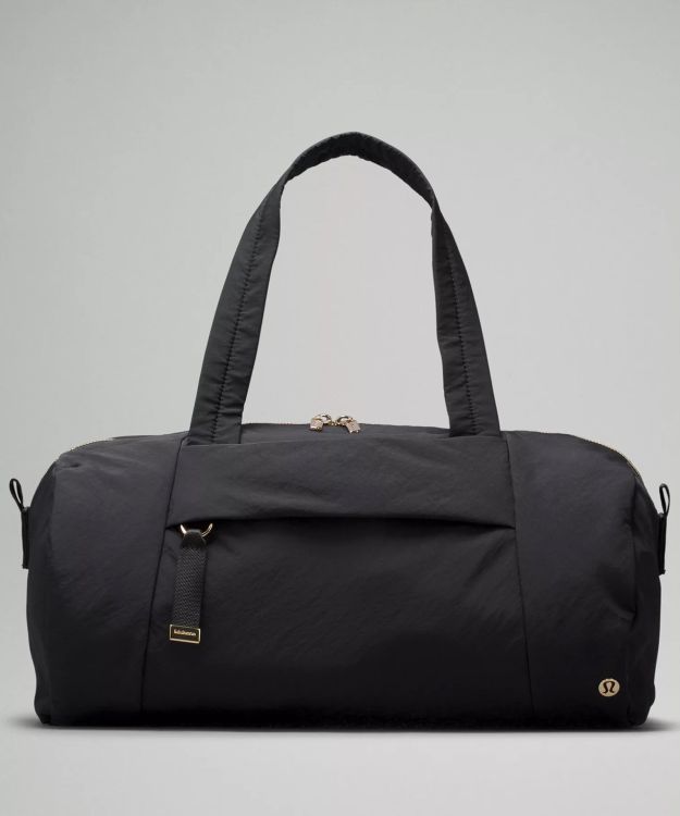 On My Level 女士桶型行李包