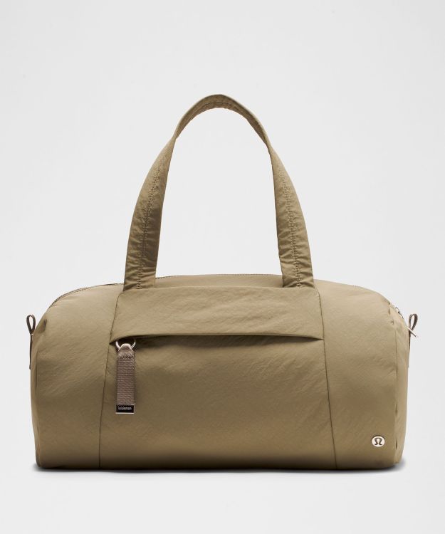 On My Level 女士桶型行李包 拒水